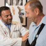 Dr. Vladimir Alexander treating a shoulder replacement patient