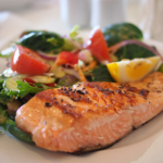 Grilled salmon with a side salad