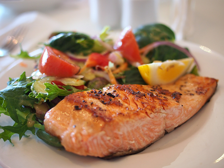 Grilled salmon with a side salad